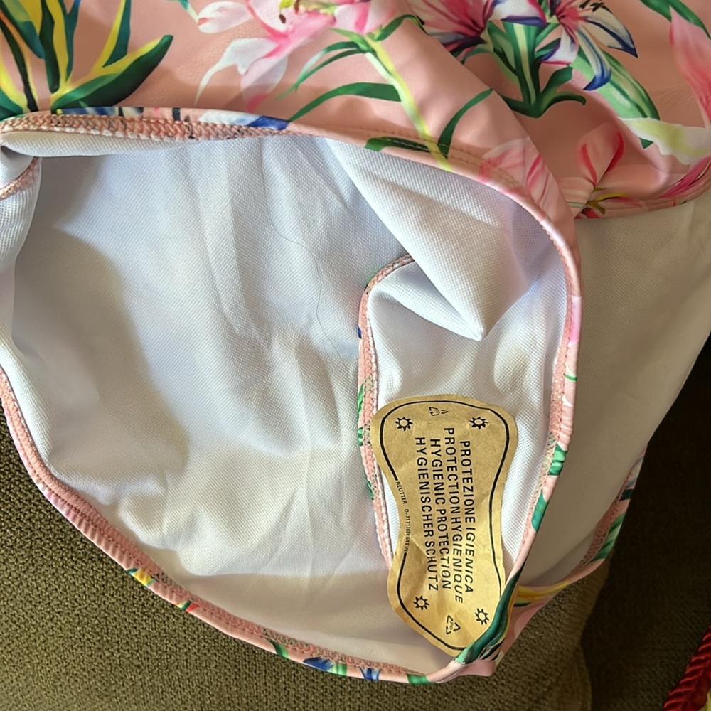 Bathing suit and matching cover up skirt. - Picture 6 of 12